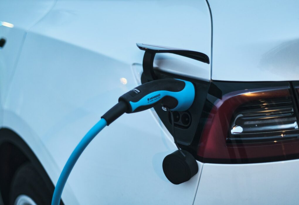 Electric car charging at a charging station